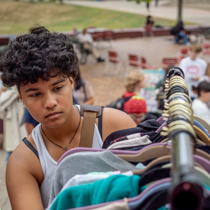 A student shopping at Creators' Marketplace