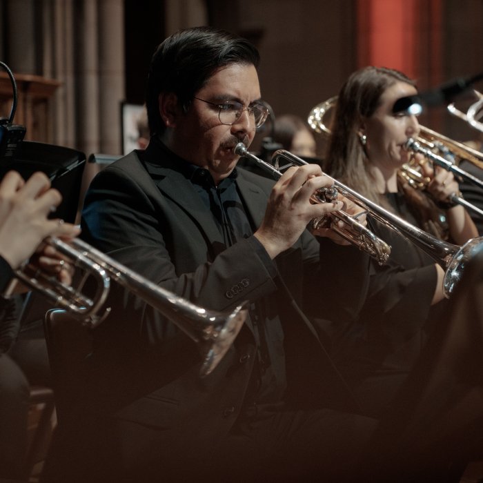 CaliBrass Ensemble on stage at the Music 250 concert at Trinity Church NYC, conducted by Dr. Thomas McCauley and organized by Dr. Micah Killion.