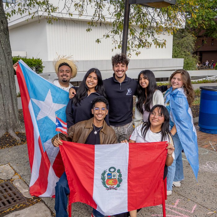 HHM Block Party Pic of Students and Flags