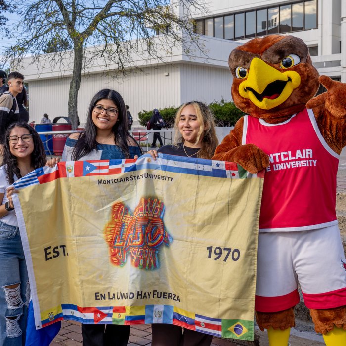 HHM Block Party photo with Rocky and LASO students