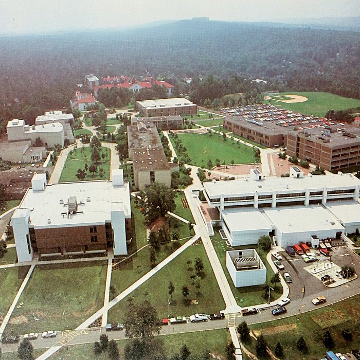 Aerial view of back of student union with gas station, 1980