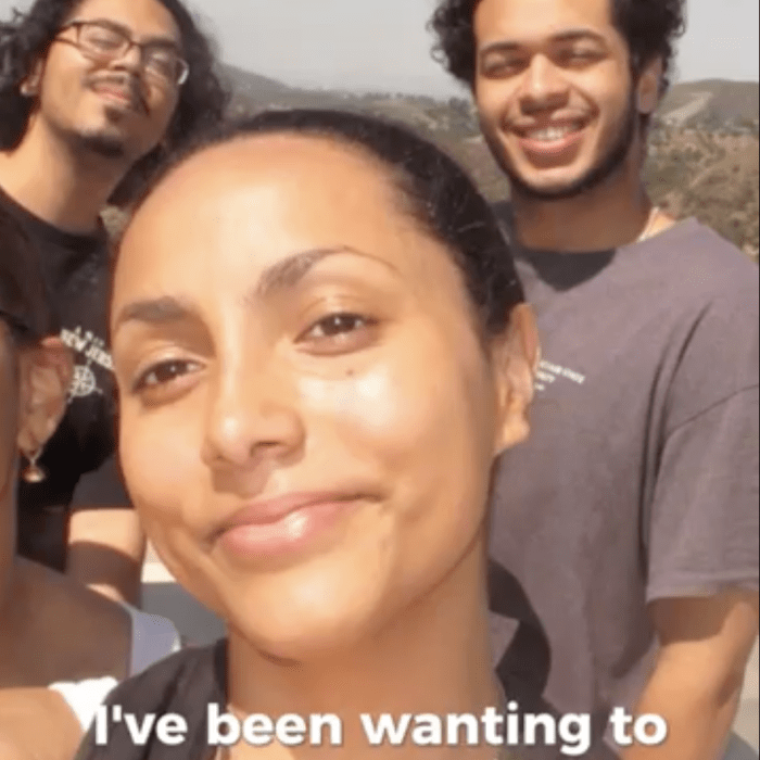 Student taking a selfie with classmates in LA.