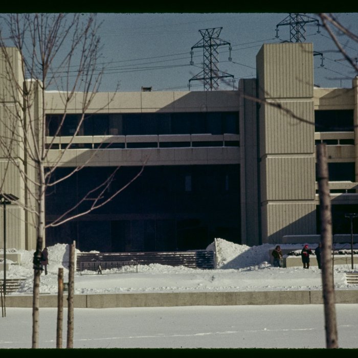 Student Center with snow piles in front, 1975