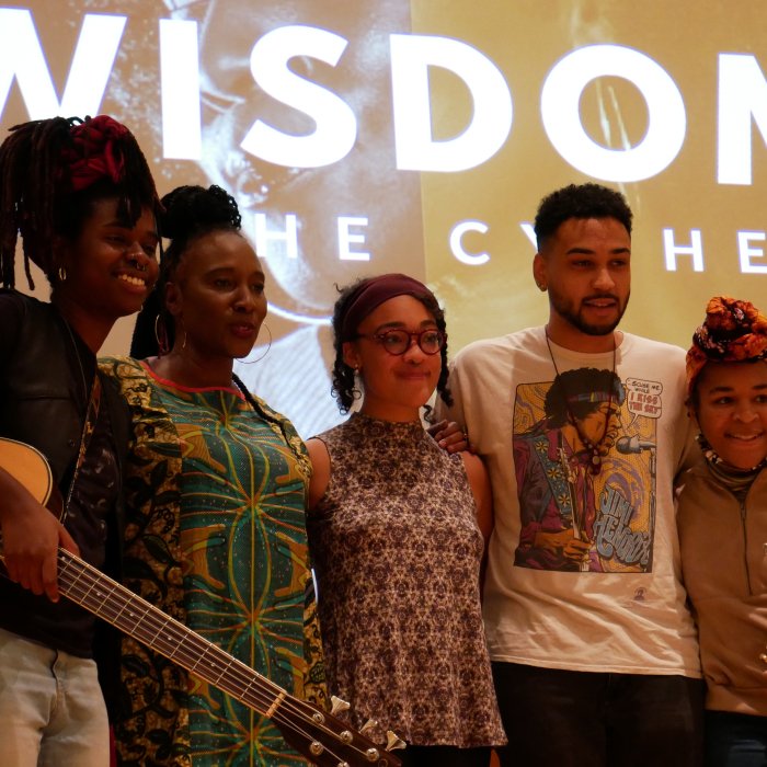 Toni Blackman Midweek with group of students on stage