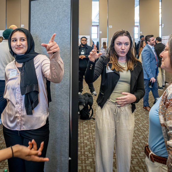 Students presenting their posters