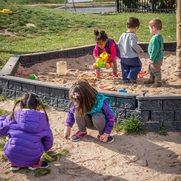 kids playing in the sand
