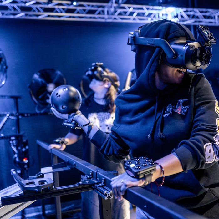 People in VR headsets at Dreamscape Opening on the Montclair Campus