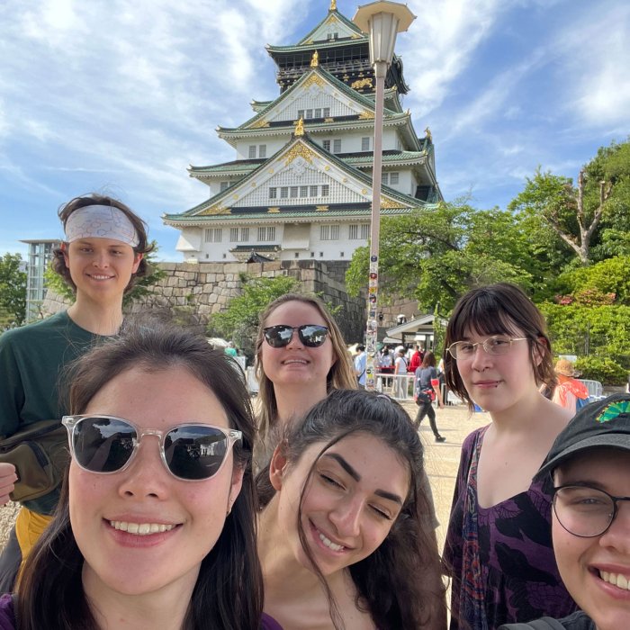 selfie in front of ornate Japanese building