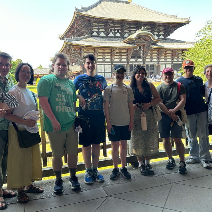 IRES 2026 group sightseeing, photo in front of building