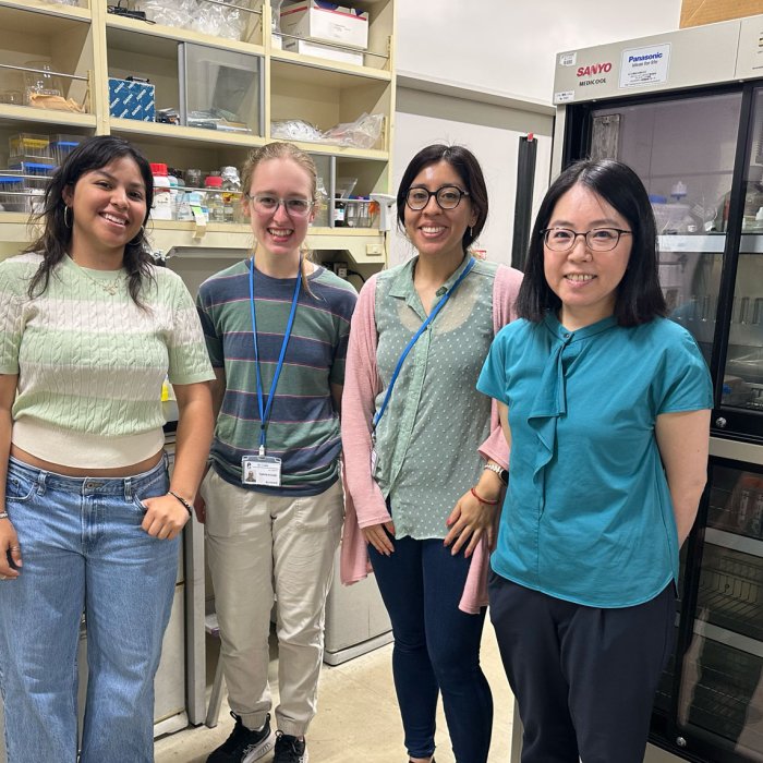 IRES 2026 students and mentor in lab