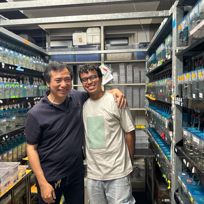 IRES 2026 student with mentor in fish room