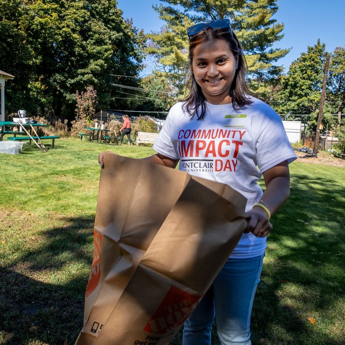 A Montclair employees bags yard debris.
