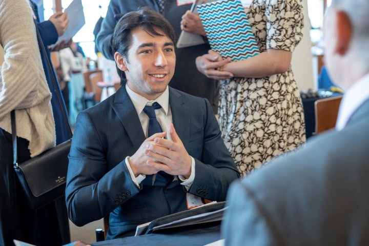 A student interviews at the Educators Exchange Career Fair