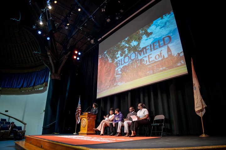 Stage and podium with guest speakers