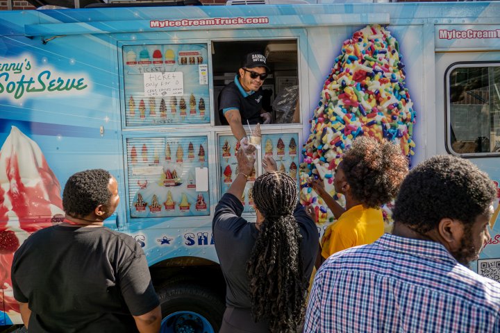 People in front of ice cream truck