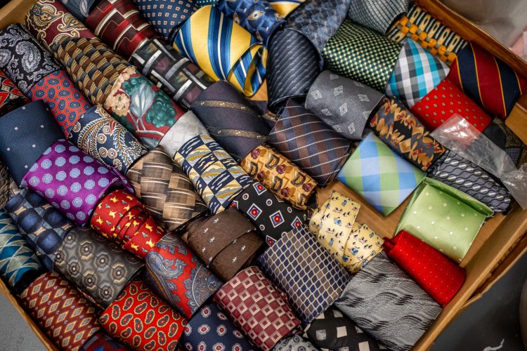 Collection of ties, all different colors.