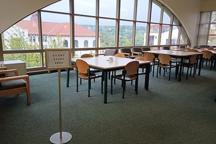 silent study space with multiple tables and chairs