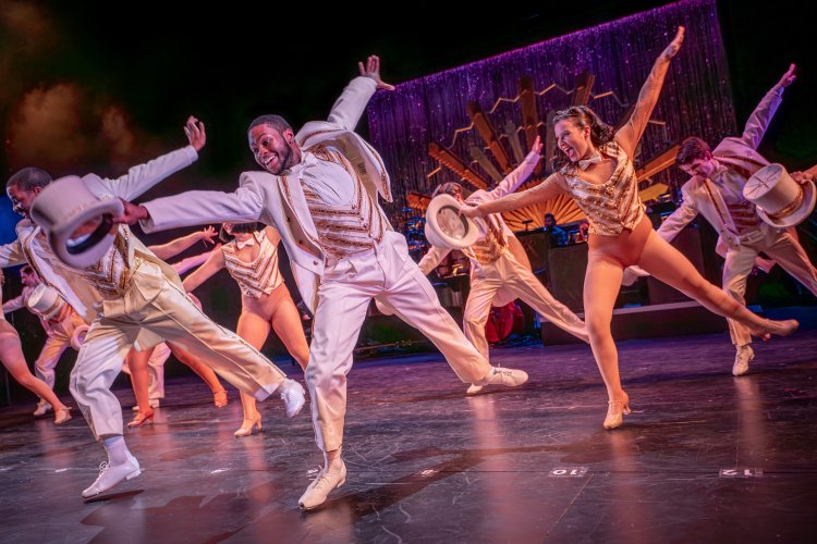 group of dancers tapping in sequence