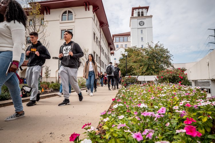 This picture shows a group of students walking on Montclair's campus.