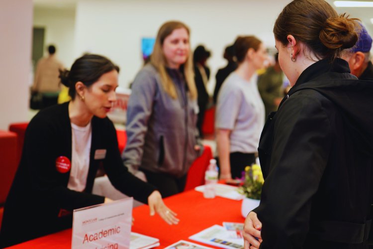 Academic advisor speaking to an accepted student at the College of Communication and Media at Montclair State University.