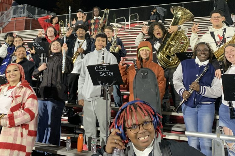 The Pep Band in the stands of a football game