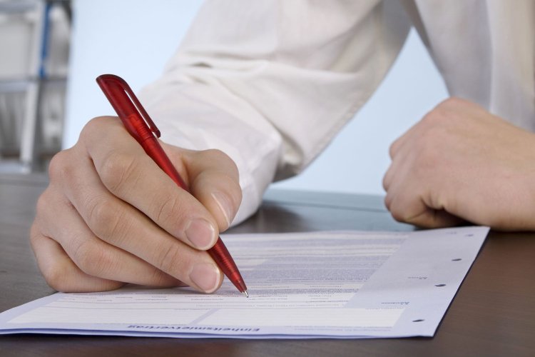 someone filling out a form