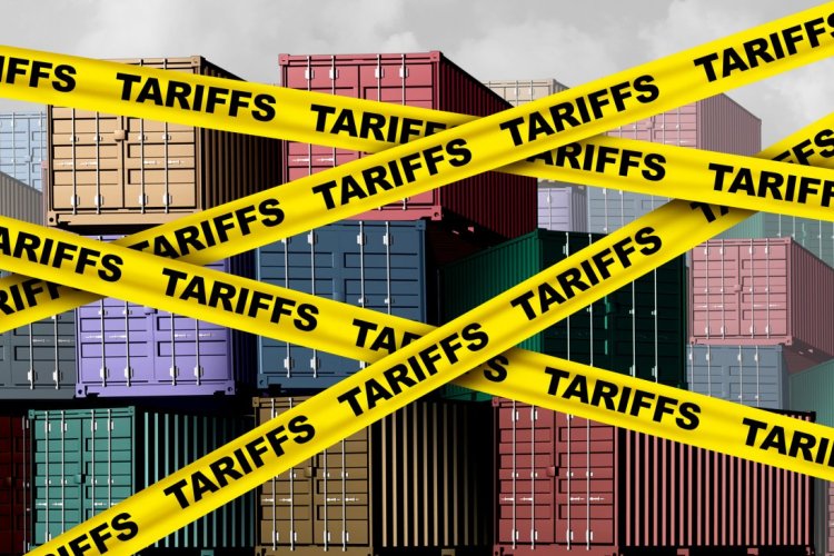 Shipping containers with yellow tariff tape