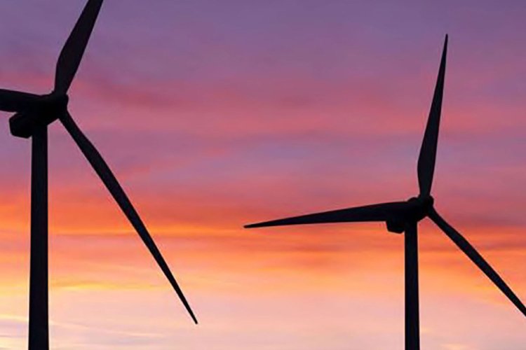 wind turbines at dusk