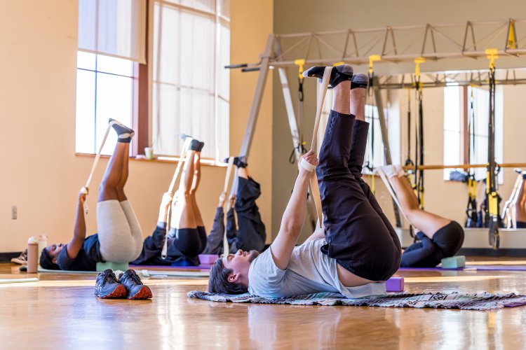 group of students taking a yoga class