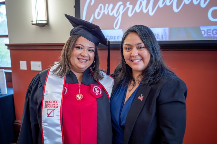 Liberal Studies Online Degree Completion student and advisor recognized at graduation send-off ceremony.