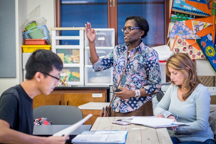 a teacher teaches two students