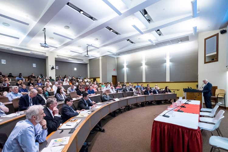 people in the conference center breakout room