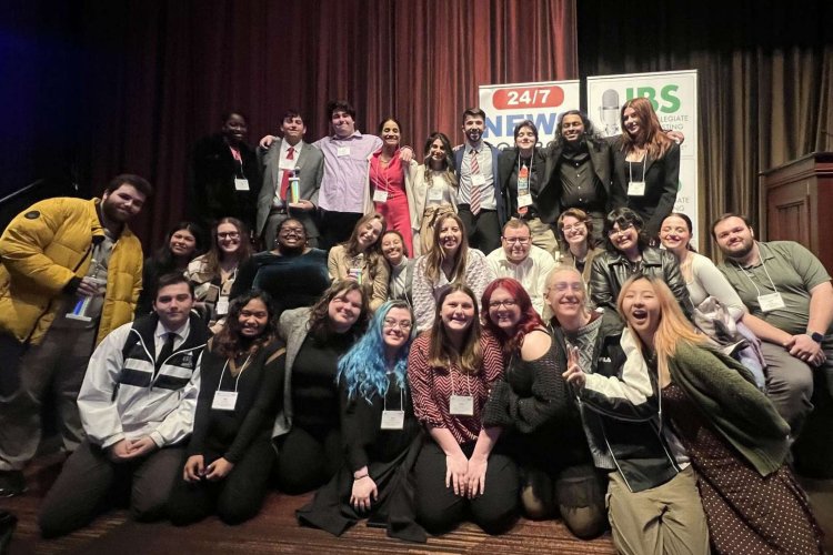 Group photo of students and faculty at the IBS awards.