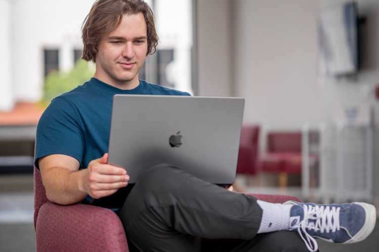 Student with computer 