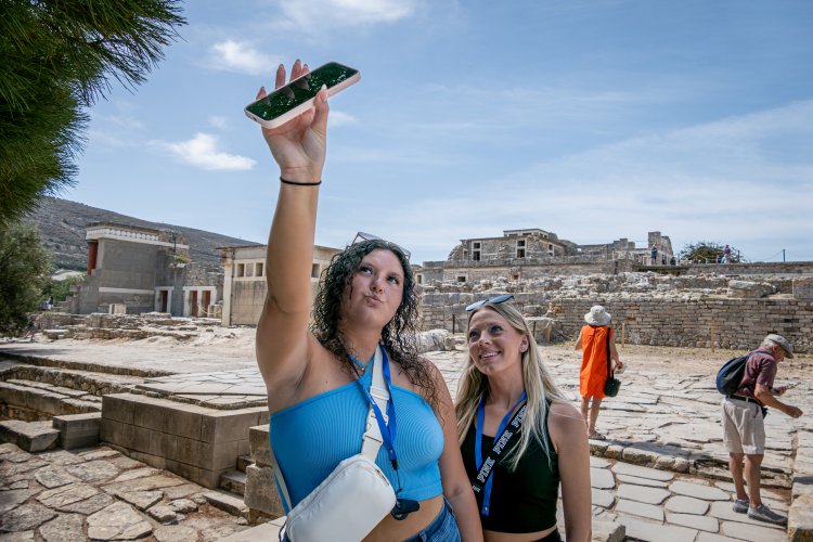 two students talking a selfie in greece