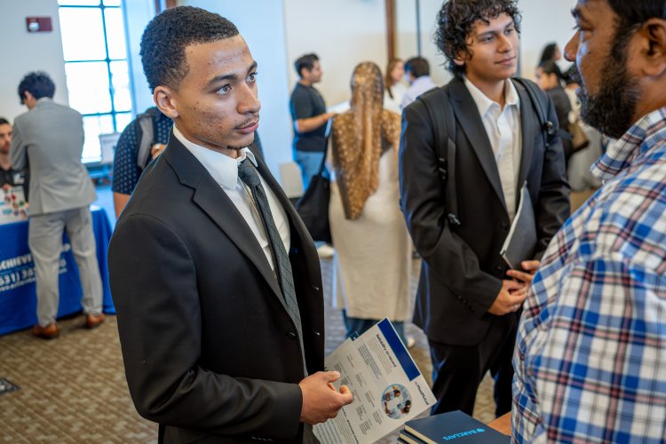 student networking with a professional