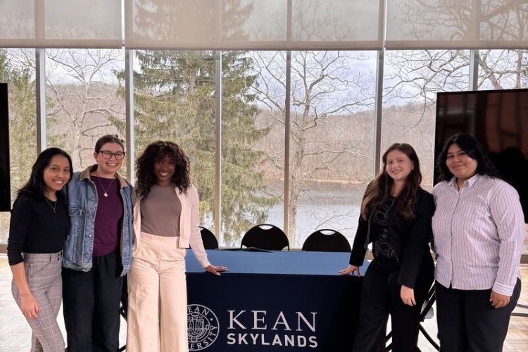 Students from Montclair and Kean pose for a group photo.