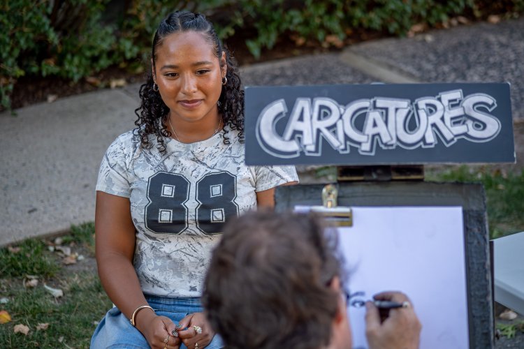 Artist drawing cartoon of a woman