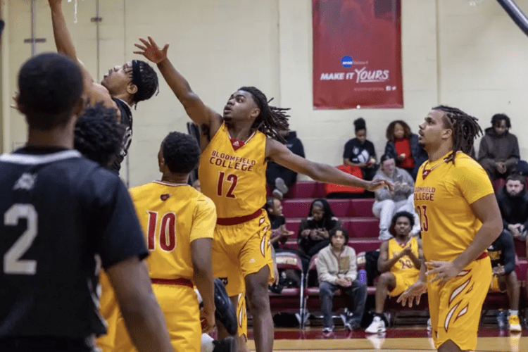 Men playing basketball