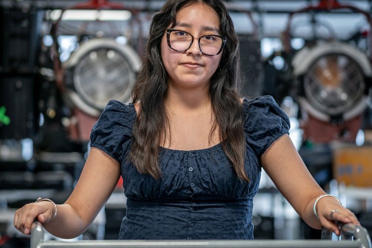 student with glasses in lab