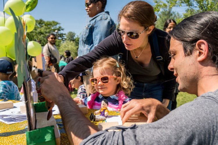 parents doing activities with child