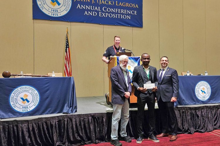 Odera Umeh receiving John J. LaGrosa Award at NJWEA conference