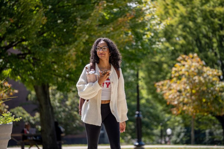 Student walking on campus.