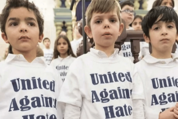 image of children wearing United Against Hate shirts