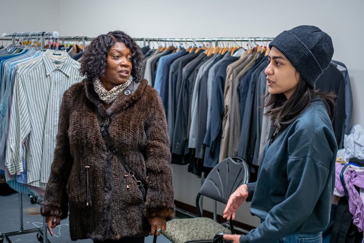 two people standing in rocky's closet