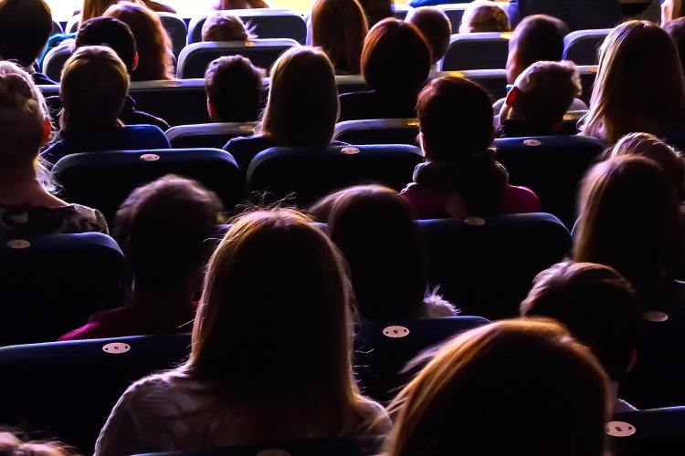 People in a theatre