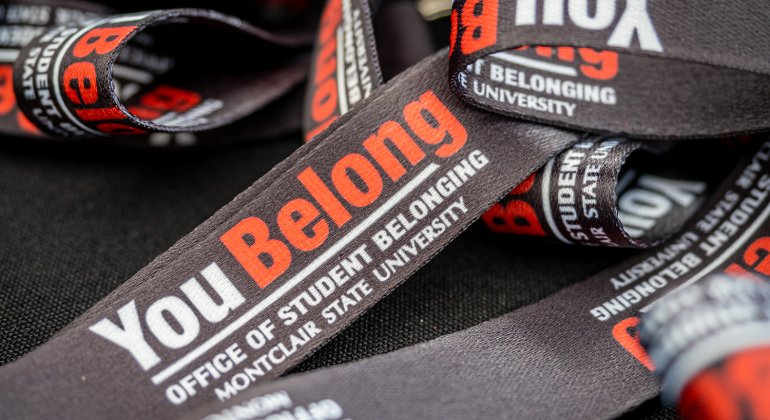 close up of lanyards that say You Belong