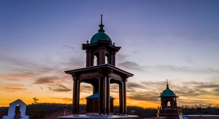Aerial view of Cole Hall bell towers at dusk