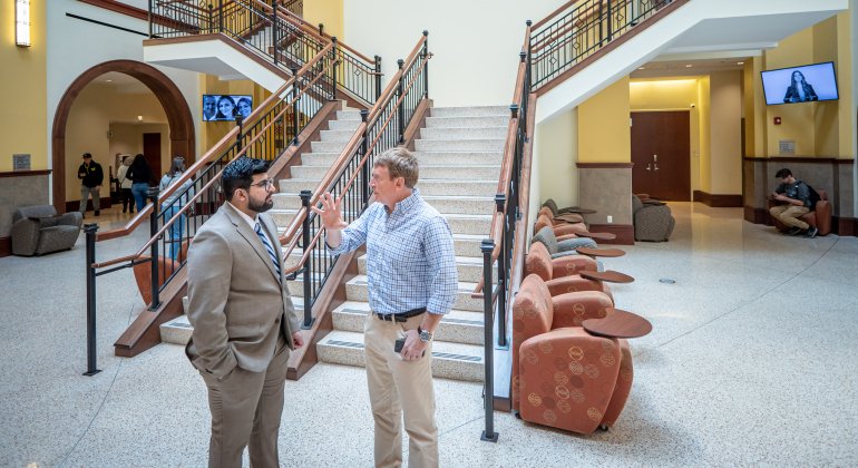 A student and mentor talking