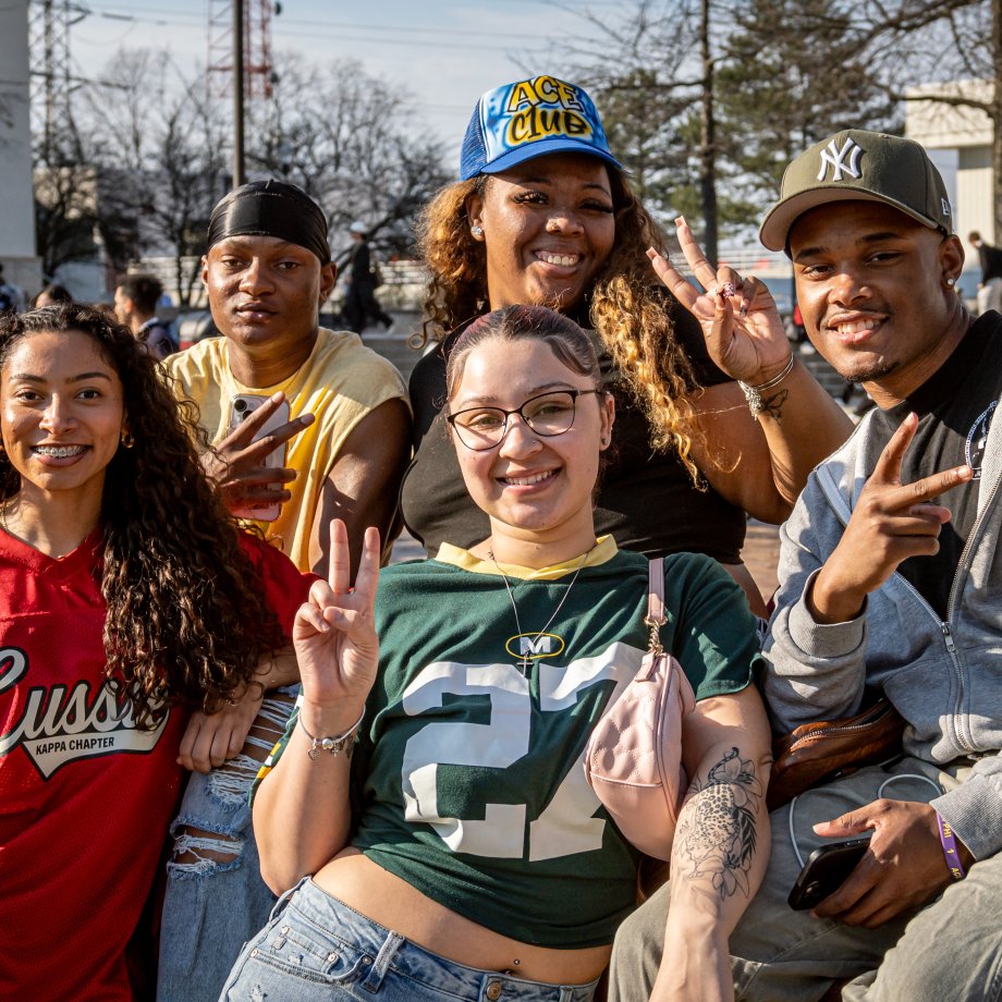 a diverse group of students smiling